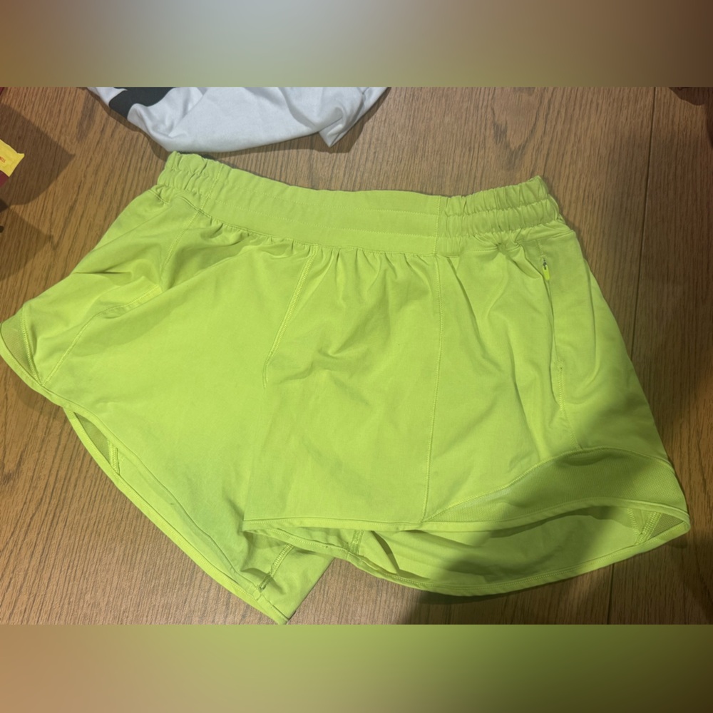 Neon yellow lululemon size ten low rise four inch Hotty hot shorts